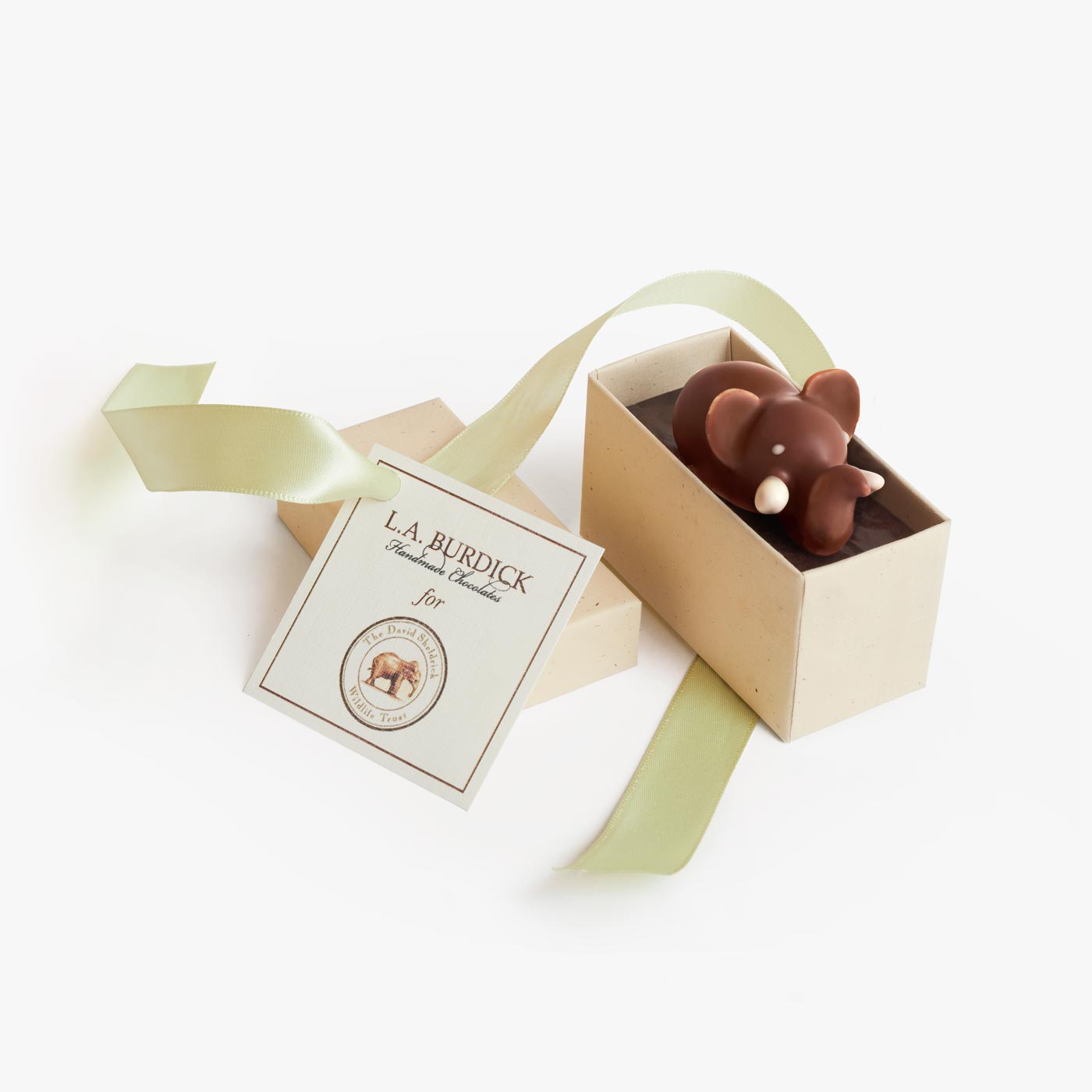 Dark Chocolate Elephant is hand-piped with dark chocolate ganache blended with passion fruits and a hint of Amarula cream liqueur and hand-dipped in dark chocolate, in an elegant gift box.